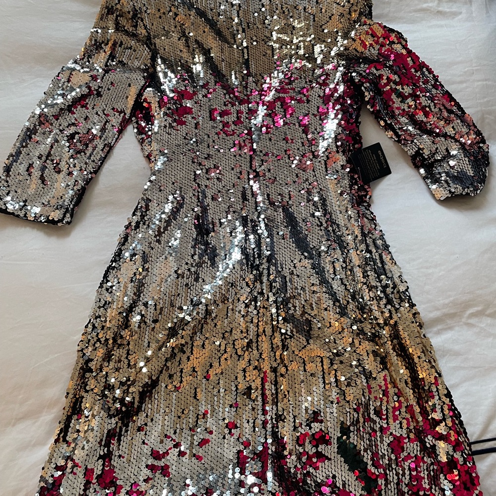 NWT Bebe long sleeved sequined dress